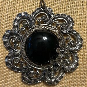 Elegant Silver-tone and Black Floral Pendant
